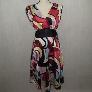 Roulette Dress V Neck Size 6 Sash Flower Design